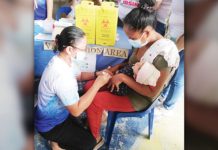 An infant receives a vaccine during the Department of Health’s “Big Catch-Up” immunization program at Barangay Supa Gymnasium in San Jose de Buenavista, Antique on Wednesday, Feb. 26, 2025. PNA PHOTO BY ANNABEL CONSUELO J. PETINGLAY