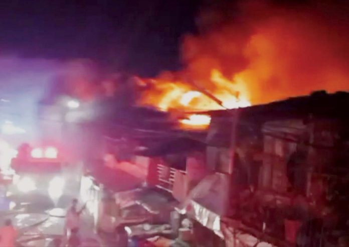 A fire gobbled up 15 houses in Barangay 17, Bacolod City on Feb. 14, 2025. SCREENSHOT FROM FACEBOOK VIDEO