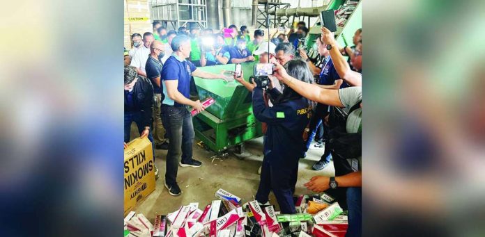 Bureau of Internal Revenue Commissioner Romeo Lumagui Jr. leads the destruction of seized illicit cigarettes in Porac, Pampanga on Monday, Feb. 24, 2025. ROMEO “JUNE” LUMAGUI JR./FACEBOOK PHOTO