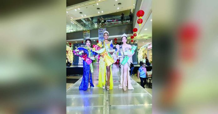 The newly crowned Miss Jaro 2025, Ashlee Emilliene Ngu (center), strikes a pose with her fellow finalists, Ma. Alessandra Louise Huyaban (right, the first runner-up) and Marie Krystel Angela Jacildo, the second runner-up, during the coronation night at Robinsons Place Jaro on February 1. Photo from MH Del Pilar Facebook Page