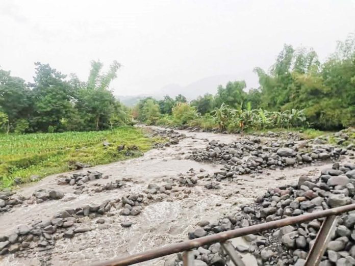 Continuous rainfall has transformed ash deposits into mudflows along the Buhangin River which flows along La Castellana and Moises Padilla towns in Negros Occidental. The mudflows were preceded by a minor explosive eruption of Kanlon volcano at 3:11 p.m. on February 6, 2025. TASK FORCE KANLAON RIMT / LA CASTELLANA MDRRMO