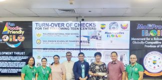 Gov. Arthur Defensor Jr. of Iloilo and Provincial Population Office chief Atty. Ruel Von Superio hand over a P3.5-million check to Mina National High School for the construction of a teen center. The check was received by Mayor Lydia Grabato at the Iloilo Provincial Capitol on February 25. PHOTO FROM BALITA SA KAPITOLYO FACEBOOK PAGE