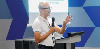 Engr. Bailey del Castillo, Chief Operations Officer of Negros Power, leads a dialogue with barangay officials and residents in Bacolod City during the "PaKAPe Program."