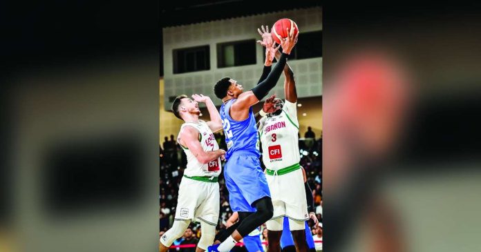 Gilas Pilipinas’ Justin Brownlee attacks the defense of Lebanon for a layup. PHOTO COURTESY OF DUBAI BASKETBALL FEDERATION