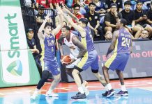 TNT Tropang Giga’s John Paul Erram and Calvin Oftana tightly defend Rain or Shine Elasto Painters’ Deon Thompson. PBA PHOTO