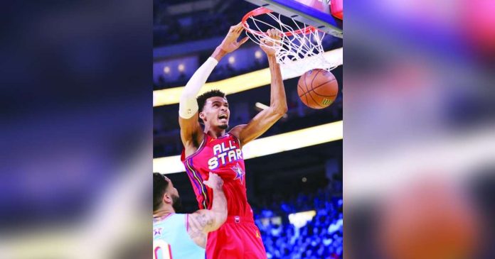 Victor Wembanyama scores on a two-handed dunk during the championship game of the 74th NBA All Star Game in San Francisco, California. PHOTO COURTESY OF SCOTT STRAZZANTE/AP