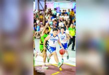 St. Robert’s International Academy Panda Rocket-Elite Lab’s Matt Owen Chua dribbles the ball while being defended by a player from Lambunao. PHOTO COURTESY OF SHOTS BY MIKE