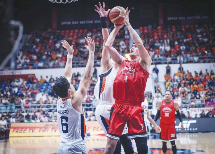 Barangay Ginebra San Miguel Kings’ Jeth Troy Rosario attacks the Meralco Bolts’ defense for an inside hit. PBA PHOTO