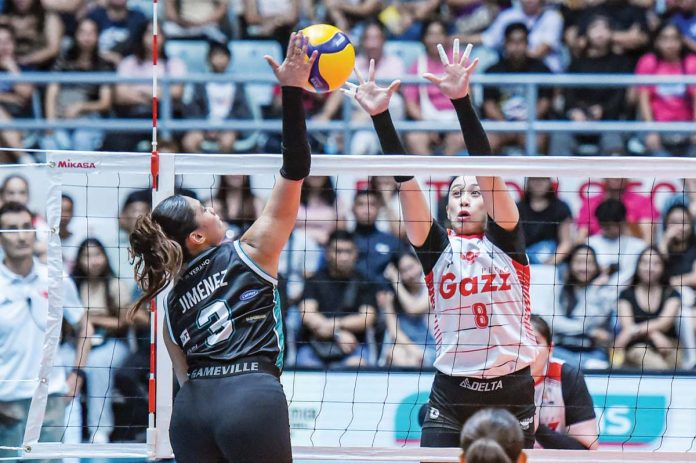 Ilongga Aiza Maizo-Pontillas of Petro Gazz Angels attempts to block the shot of Galeries Tower Highrisers’ Ysabel Jimenez. PVL PHOTO