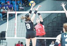 Ilongga Aiza Maizo-Pontillas of Petro Gazz Angels tries to score against Chiara Permentilla of NxLed Chameleons. PVL PHOTO