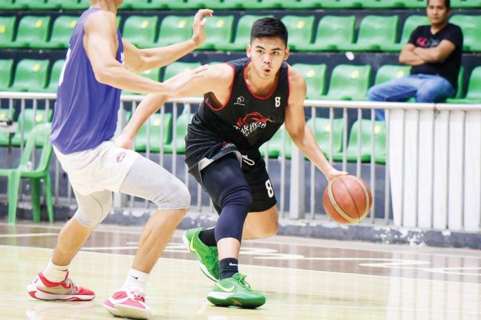 Sherwin Concepcion of Starhorse-Basilan wards off a defender. PHOTO COURTESY OF STARHORSE-BASILAN