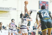 Kent Jane Pastrana of the University of Santo Tomas Growling Tigresses scores against a Centro Escolar University Scorpions defenders. WMPBL PHOTO