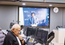 Former President Rodrigo Duterte makes his first appearance at the International Criminal Court via video link in The Hague, Netherlands. In this pre-trial hearing, the judges verified his identity, informed him of the charges against him, and enumerated his rights. Also in photo is Salvador Medialdea, his executive secretary during his term. INQUIRER.NET