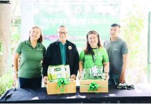 (From left): MORE Power AVP for Human Capital Management Daphne Karina De Pedro; Iloilo City Government agriculturist Ynigo Garingalao; MORE Power VP for Marketing and Corporate Affairs and Customer Care Department, Ma. Cristina D. Cabalhin, and Allied Botanical’s Erwin Elmido. Garingalao receives seeds from MORE Power and Allied Botanical for the Uswag Nursery. This initiative promotes urban gardening and sustainability in Iloilo City.