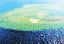 An aerial photo taken by the Philippine Coast Guard shows the wide expanse of Escoda (Sabina) Shoal coveted by China within the Philippines’ exclusive economic zone in the West Philippine Sea. INQUIRER FILES