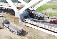 The third span of this 990-meter Cabagan-Santa Maria Bridge in Cabagan, Isabela, came crashing down, along with a dump truck, whose content of quarried stones have been spilled all over the damaged section of the span. Four other vehicles also crossing the newly completed bridge at that time were damaged, injuring six people. PHILIPPINE DAILY INQUIRER, VILLAMOR VISAYA JR.