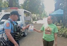 Dumalag police conduct community engagement thru dialogue and distribution of infographic materials related to the prohibited acts during election period, strict implementation of the Commission on Elections gun ban, and anti-illegal drugs campaign, among others in Barangay Poblacion, Dumalag, Capiz, on March 13, 2025. DUMALAG MUNICIPAL POLICE STATION PHOTO