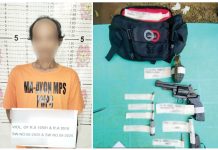 Two guns, ammunition and a grenade were seized from alias"Nante" in a raid in Barangay Cabungahan, Maayon, Capiz on March 5, 2025. CAPIZ PPO PHOTOS