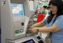 Sari-sari store owner Vilma Guray deposits her coins in the coin deposit machine. The Bangko Sentral ng Pilipinas has collected more than P1.308 billion through its coin deposit machines as of Feb. 15, 2025. BANGKO SENTRAL NG PILIPINAS PHOTO