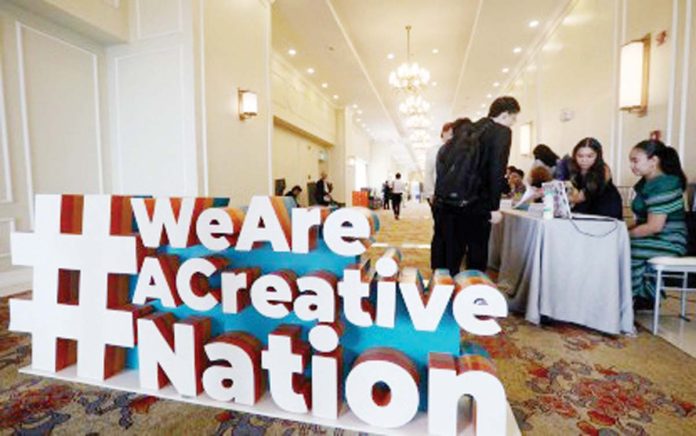 A large Creative Nation Summit stand is installed at the entrance of the venue as attendees arrive for the 2024 Creative Nation Summit at the Rizal Park Hotel in Manila on September 30, 2024. The Philippine Statistics Authority said on Thursday, March 20, 2025, that the local creative economy grew by 8.7 percent last year. PNA PHOTO BY YANCY LIM