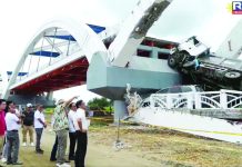 President Ferdinand R. Marcos Jr. visits the site of the collapsed Cabagan-Santa Maria Bridge in Isabela province with Department of Public Works and Highways’ Secretary Manuel Bonoan. He said weak design elements contributed to the collapse, particularly the use of non-cable suspension to support the bridge. PCO