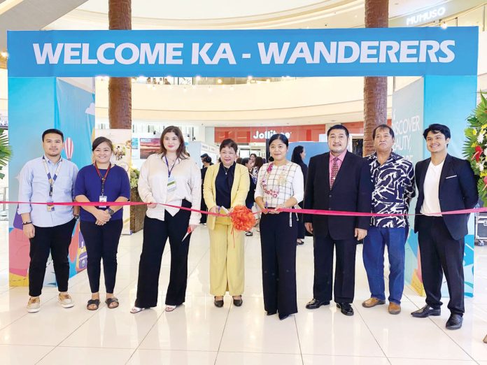 Key figures from the travel and tourism industry gather at the opening of the World Travel Expo – Western Visayas at Festive Walk Iloilo in Mandurriao, Iloilo City. Photo shows (from left) Paul Martin (Festive Walk Mall), Andrea Guanco (President, Iloilo Bloggers Society), Miles Caballero (Managing Director, Ad Asia Events Group), Teuila Metcalfe (Director of Corporate Marketing, Club Wyndham Asia), Crisma Rodriguez (Regional Director, DOT-6), Edwin Raymundo (former President, Boracay Foundation), and Admiral Leonard Tirol and Yev Gelito (Board of Directors, Boracay Foundation). AJ PALCULLO PHOTO