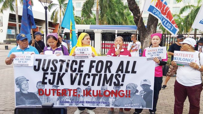 Ilonggo human rights activists stage a protest in Iloilo City upon learning of the arrest of former president Rodrigo Duterte in Metro Manila on March 11. The demand justice for victims of extrajudicial killings under the Duterte administration. IME SORNITO/PN