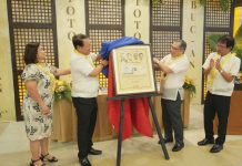 Bago City’s Mayor Nicholas Yulo (second from right) and Vice Mayor Ramon Torres (right), with PHLPost postmaster general and chief executive officer Luis Carlos (second from left) and area director Dr. Donabel Asuncion, lead the unveiling of the commemorative stamps featuring four distinguished sons of Bago in rites held at the Bago City Community Center on March 4.