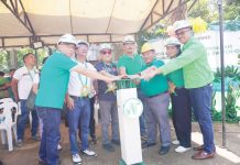 (From left) Sitio Electrification Program Project Manager Engr. Leomel Tambanillo; Bago City’s Vice Mayor Ramon Torres and Mayor Nicholas Yulo; Punong Barangay Remy Jalea of Binubuhan; and Negros Power’s President Roel Castro, VP for Customer Care Maricel Pe and COO Engr. Bailey Del Castillo. NEPC PHOTO