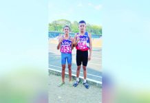 Efren Gempeson Jr. and Axel Mark Garcia clinched the gold and silver medals in the elementary boys 400-meter dash. PHOTO COURTESY OF RAY CABARLES