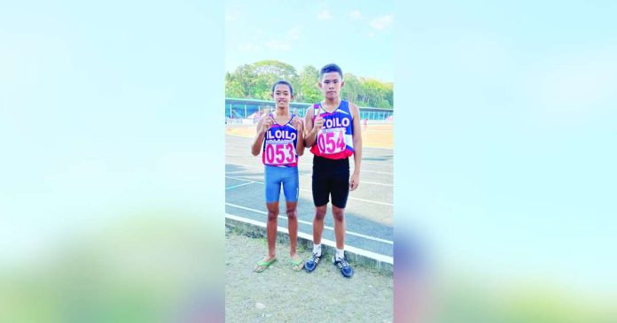 Efren Gempeson Jr. and Axel Mark Garcia clinched the gold and silver medals in the elementary boys 400-meter dash. PHOTO COURTESY OF RAY CABARLES