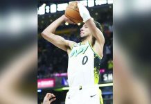 Tyrese Haliburton of Indiana Pacers pulls up for a game-winning triple against the defense of Milwaukee Bucks' Giannis Antetokounmpo. AP