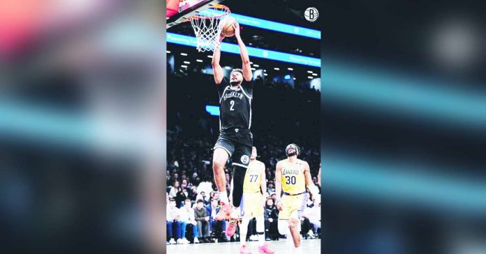 Brooklyn Nets; Cameron Johnson soars for a two-handed dunk. PHOTO COURTESY OF BROOKLYN NETS