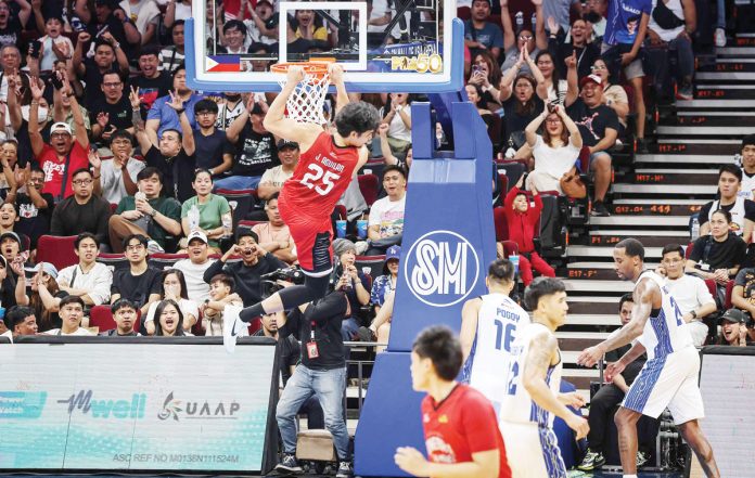 Barangay Ginebra San Miguel Kings’ Japeth Aguilar scores on a two-handed dunk. PBA PHOTO