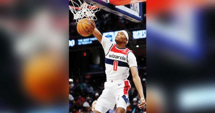 Washington Wizards’ Bilal Coulibaly rises for a two-handed dunk. PHOTO COURTESY OF GEOFF BURKE/IMAGN IMAGES