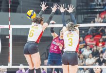 Choco Mucho Flying Titans’ Dindin Santiago-Manabat smashes the ball towards the defense of PLDT High Speed Hitters’ Savannah Davison. PVL PHOTO