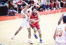 Barangay Ginebra San Miguel Kings’ Rhon Jay Abarrientos tries to score against the defense of NorthPort Batang Pier’s Evan Nelle. PBA PHOTO